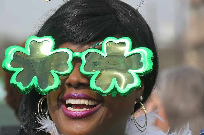 Teisha Whitfield is all smiles as she waits for the parade to start during the Dallas St....