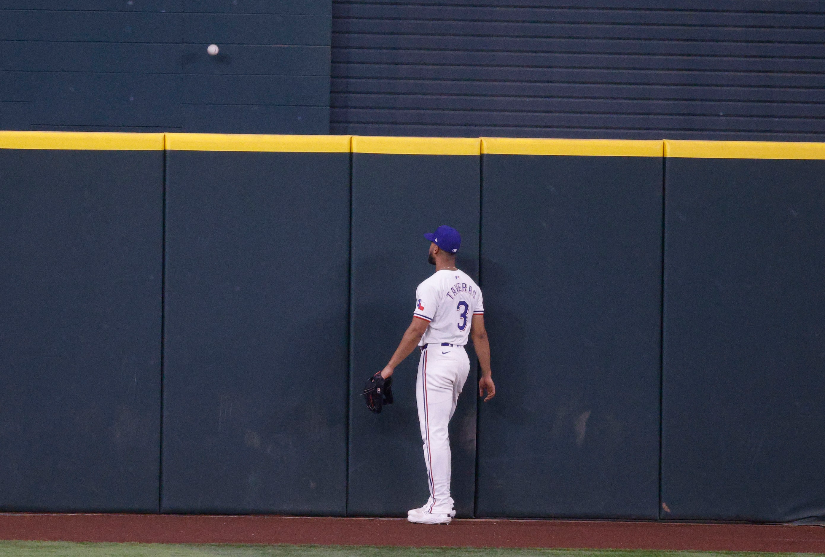 Texas Rangers outfielder Leody Taveras (3) looks up a home run by New York Yankees...