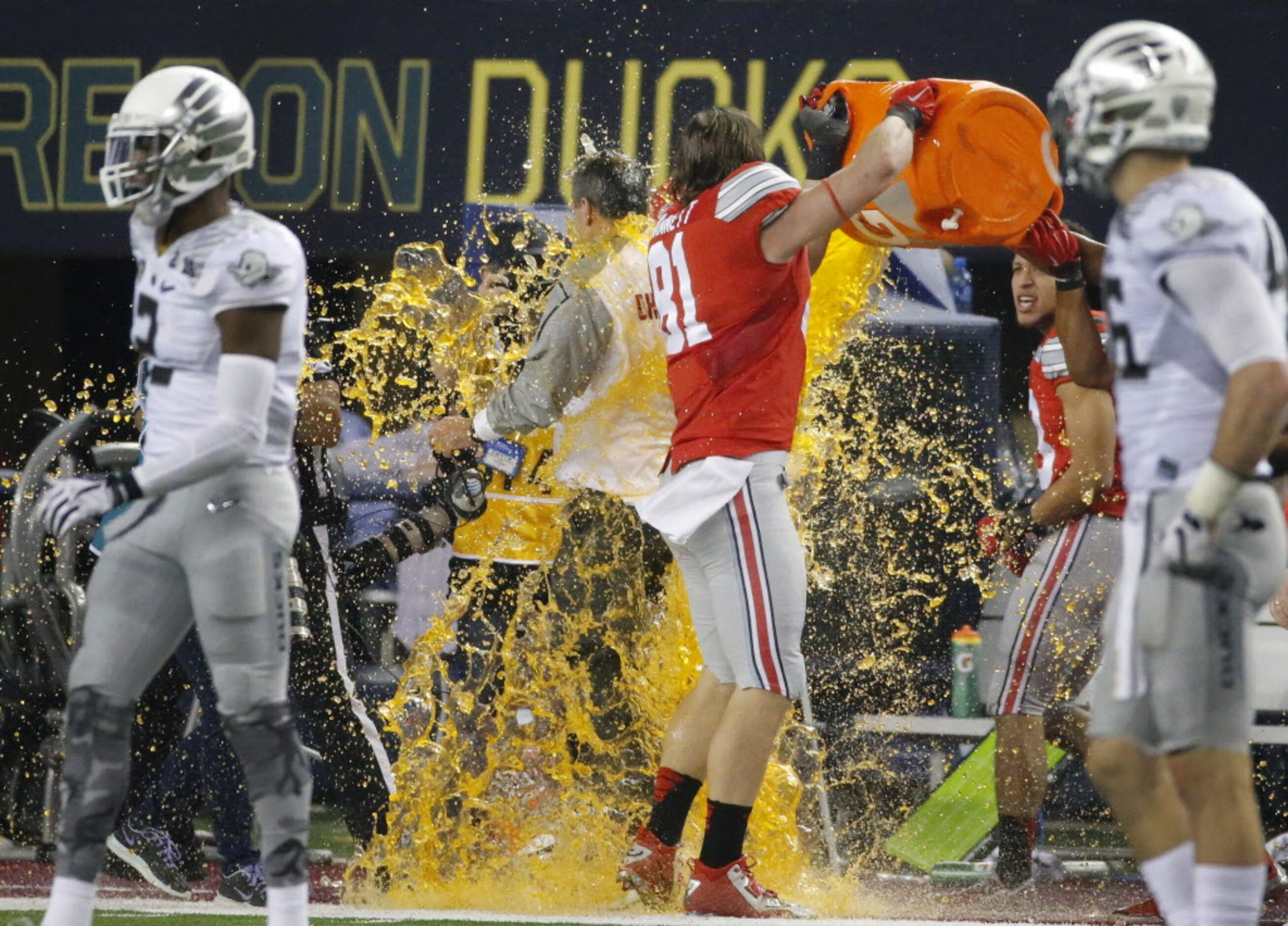 Ohio State head coach Urban Meyer gets a Gatorade shower as time runs out in the Buckeyes...