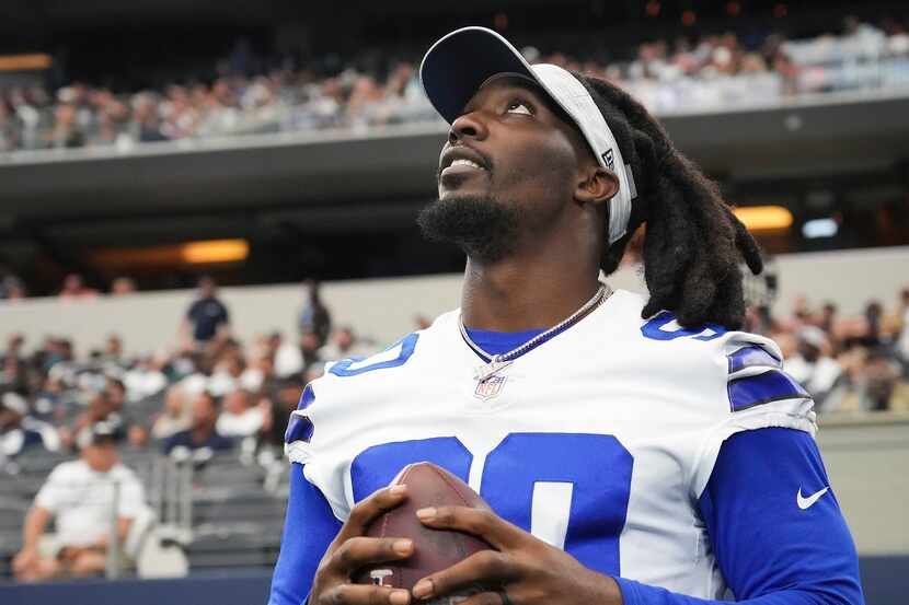 Dallas Cowboys defensive end DeMarcus Lawrence watches from the sidelines during the second...