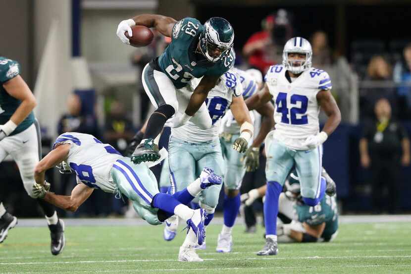 Philadelphia Eagles running back DeMarco Murray (29) leaps over Dallas Cowboys strong safety...