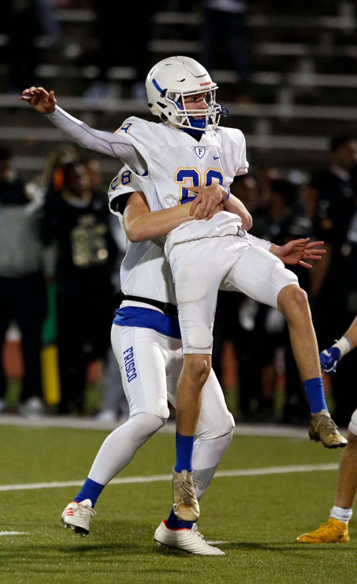 Frisco freshman kicker Mason Stallons (29) celebrates his game-winning field goal in the...