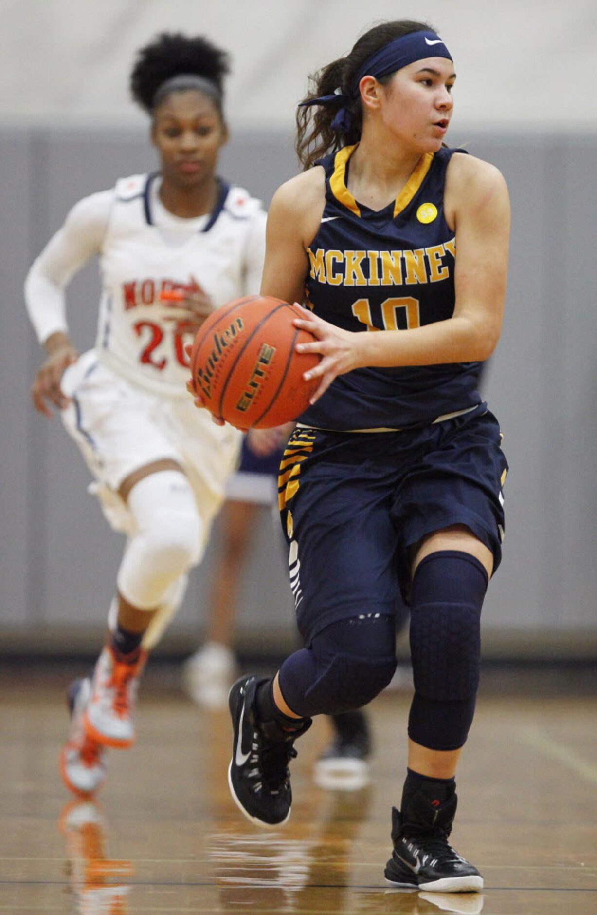 McKinney guard Krissy Fontillas (10) stops her dribble to pass in front of McKinney North's...