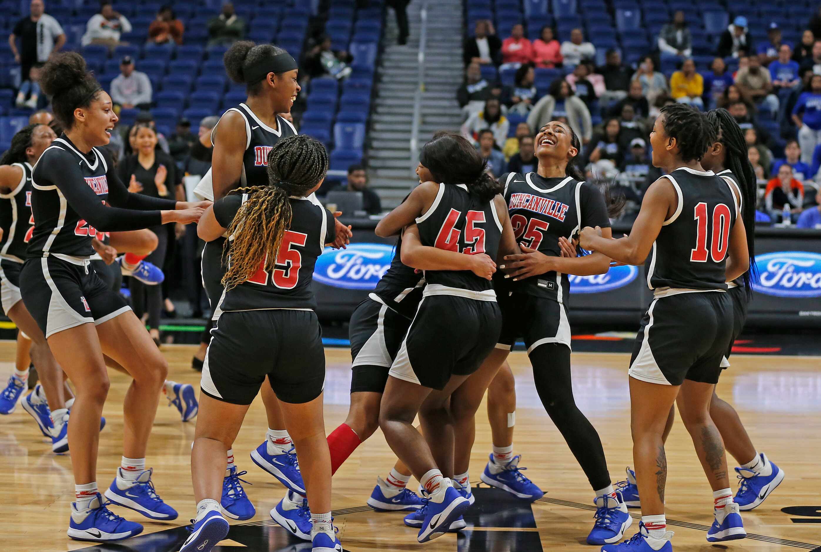 Duncanville runs the court as buzzer sounds in a 6A final on  Saturday, March 7, 2020 at the...