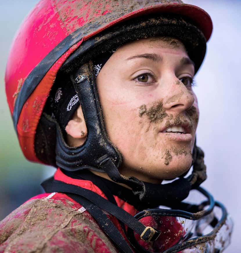 
Jockey Sasha Risenhoover rode on the muddy track Thursday night, and it showed afterward.
