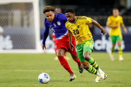 Jamaica forward Renaldo Cephas (20) dribbles the ball ahead of United States midfielder...
