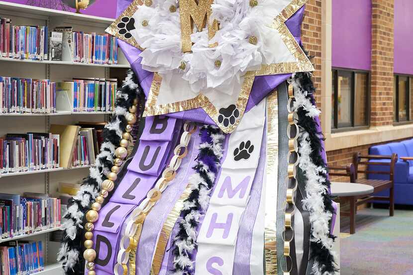 A 10-foot-tall mum made by Midland High School students sits on display in the school's...