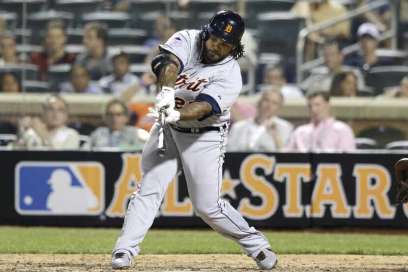 Prince Fielder, of the Detroit Tigers, hits a triple during the ninth inning of the MLB...