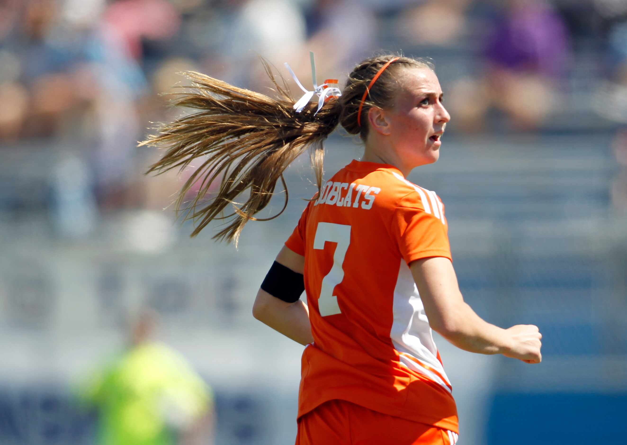 Celina's Lexi Tuite (7) looks back at a replay on the scoreboard screen after a shot during...