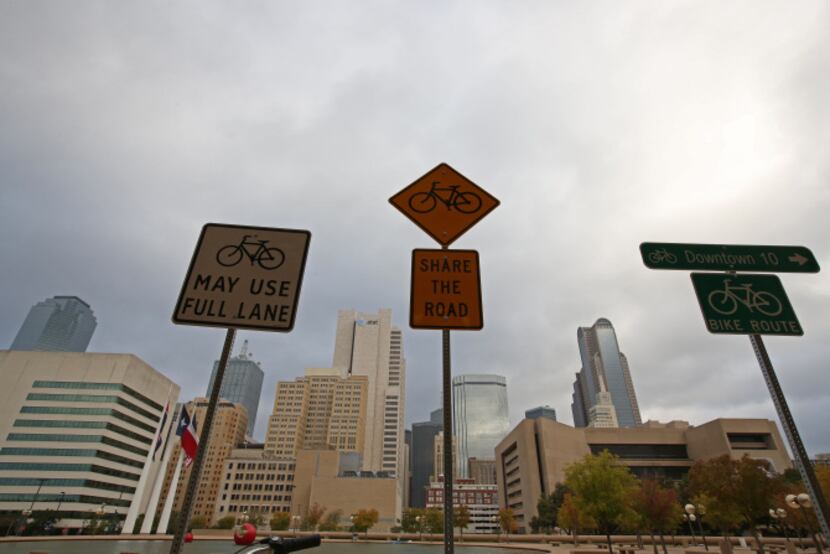 Bike signs were temporarily erected at Dallas City Hall for a press conference Wednesday...