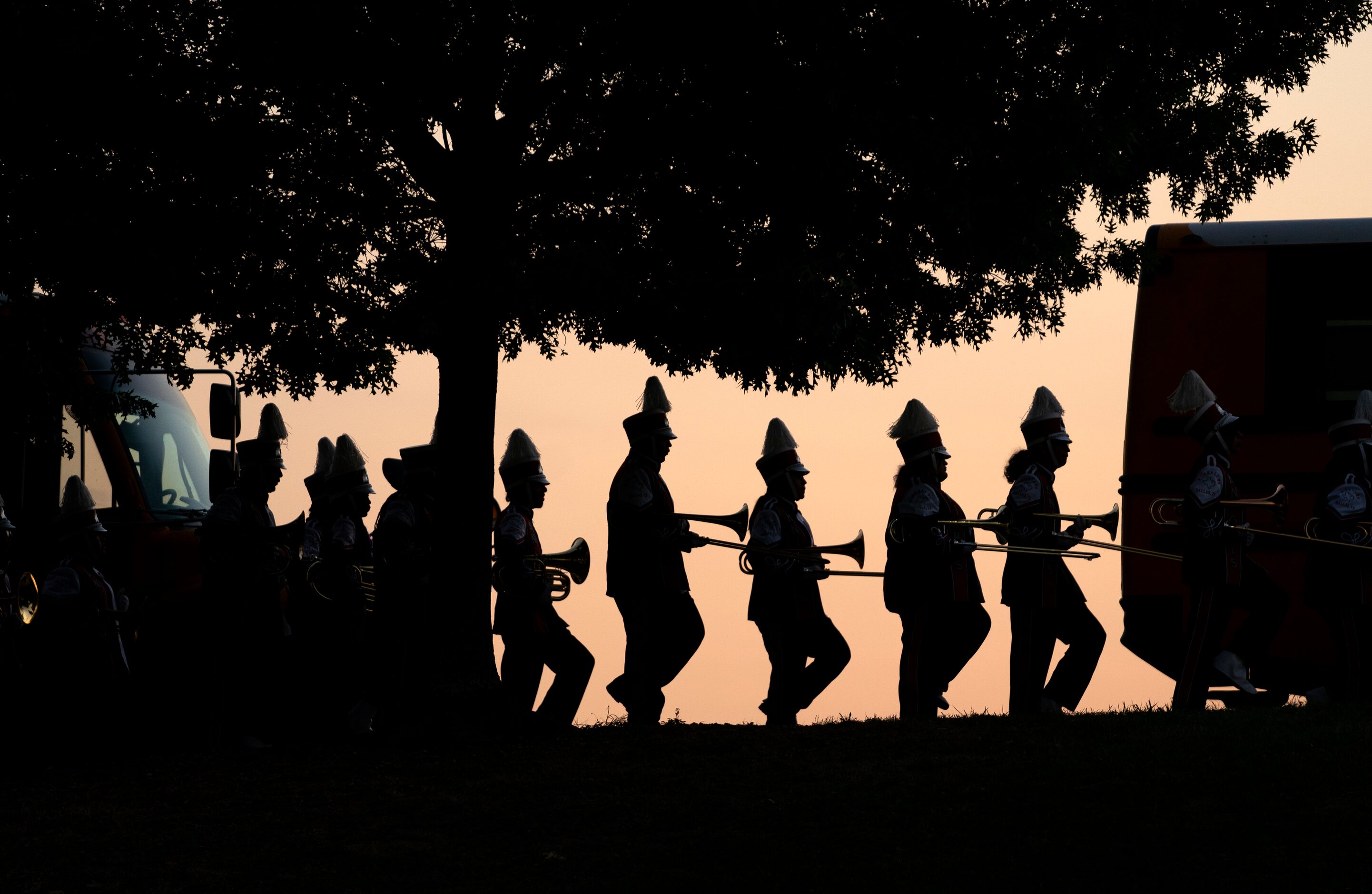 The Kimball band enters the stadium before a high school football game against South Oak...