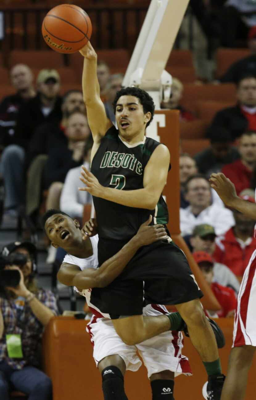 Galena Park North Shore's Jalin Hart (3) tries to stop Desoto guard Julian Miranda (2) as he...