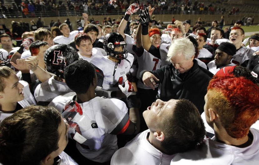 TXHSFB Rockwall-Heath reacts after head coach Mickey Moss speaks after beating Wylie in...
