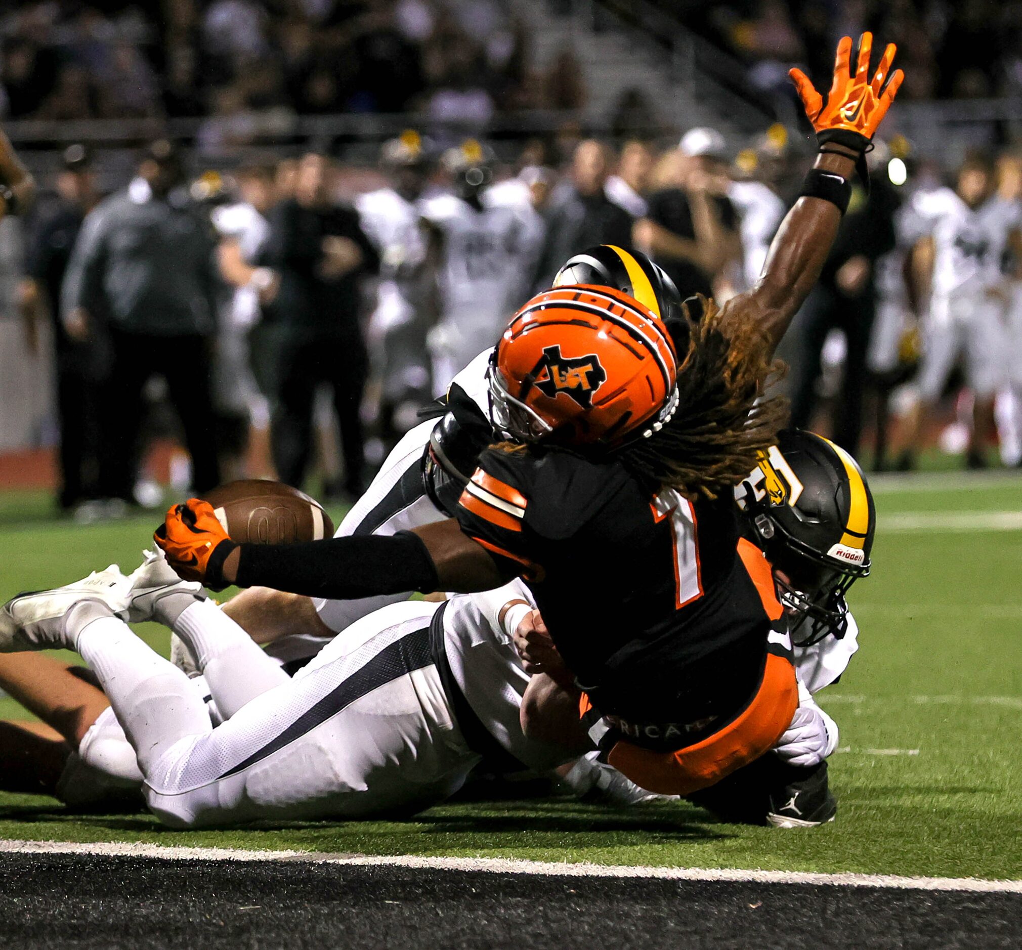 Lancaster running back Kyson Brown (1) reaches for the endzone for a touchdown against...