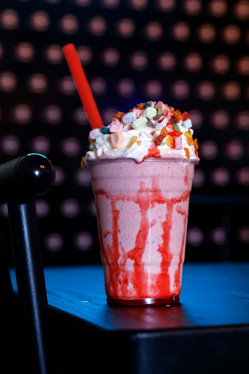 The Very Berry milkshake made with handmade strawberry ice cream topped with Trix, Lucky...