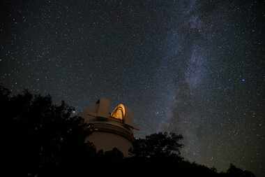 The Milky Way streams across the sky above McDonald Observatory in Fort Davis. 