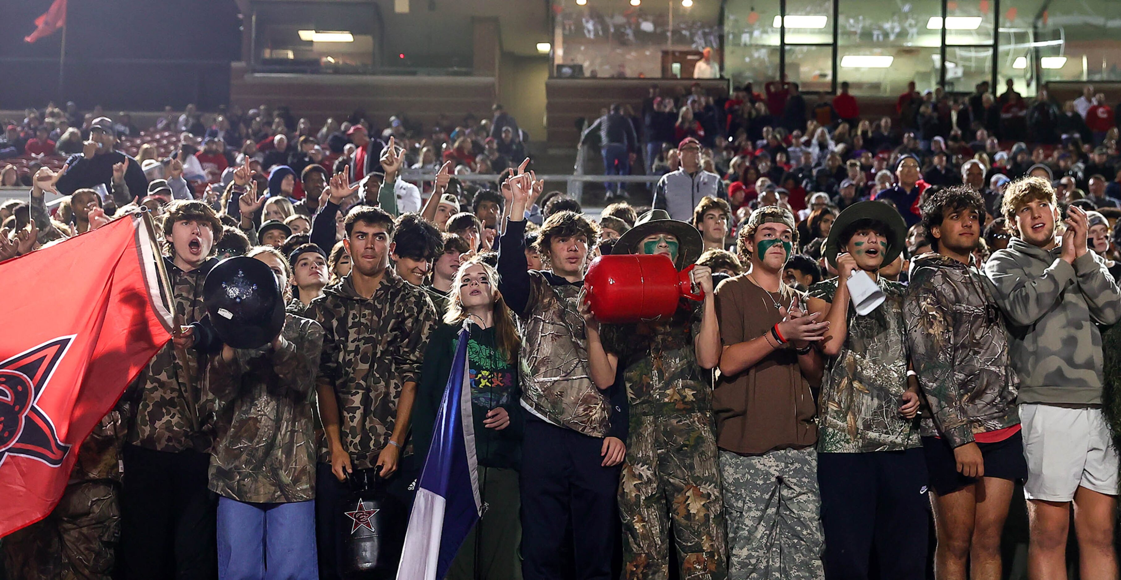 The Coppell students look on during the game against Denton Guyer in the Class 6A Division...