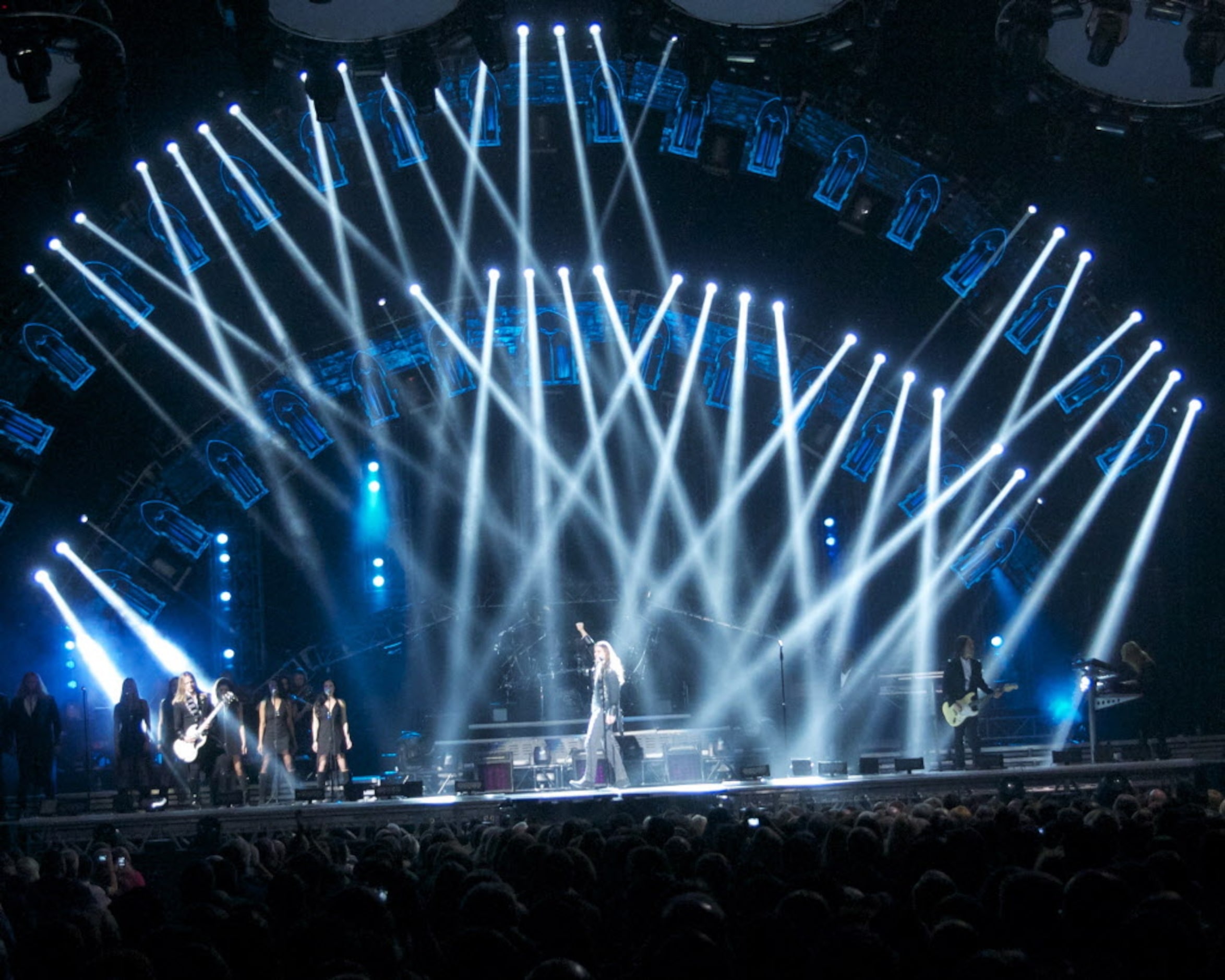 Through a cascade of blue lights Trans-Siberian Orchestra performs "Faith Noel" at their...