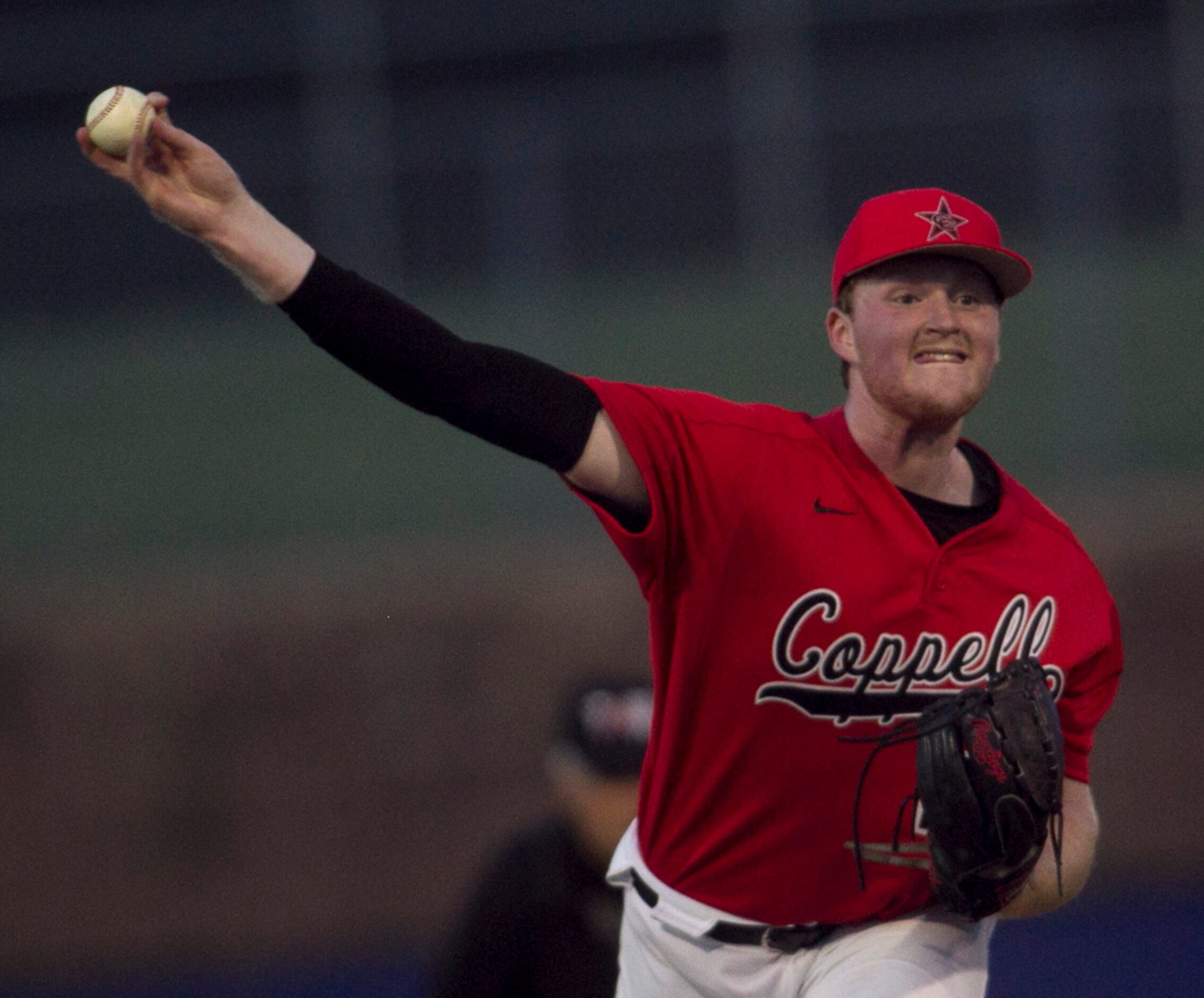 Coppell pitcher Chayton Krauss (25) delivers a pitch to a Hebron batter during the bottom of...