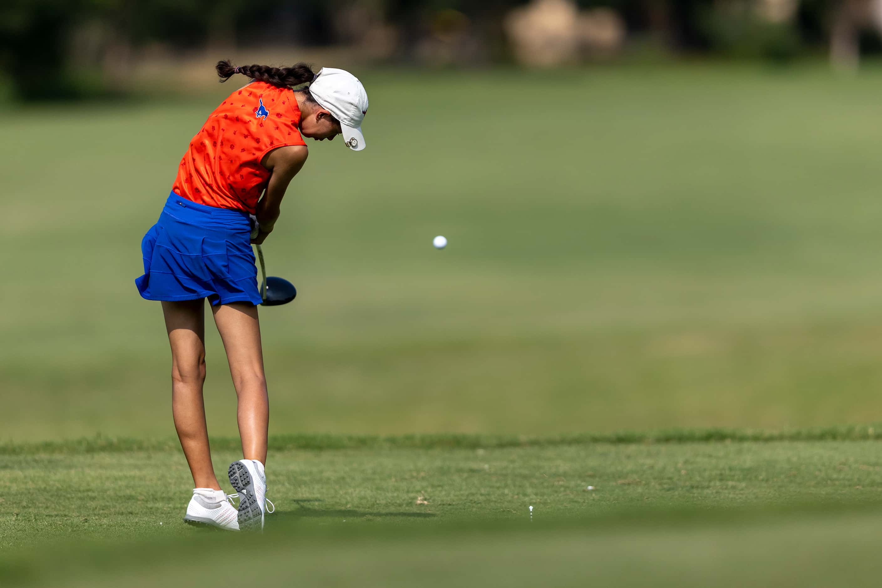 Grapevine’s Alaina Kubo hits from the 11th tee box during the 5A girls state golf tournament...
