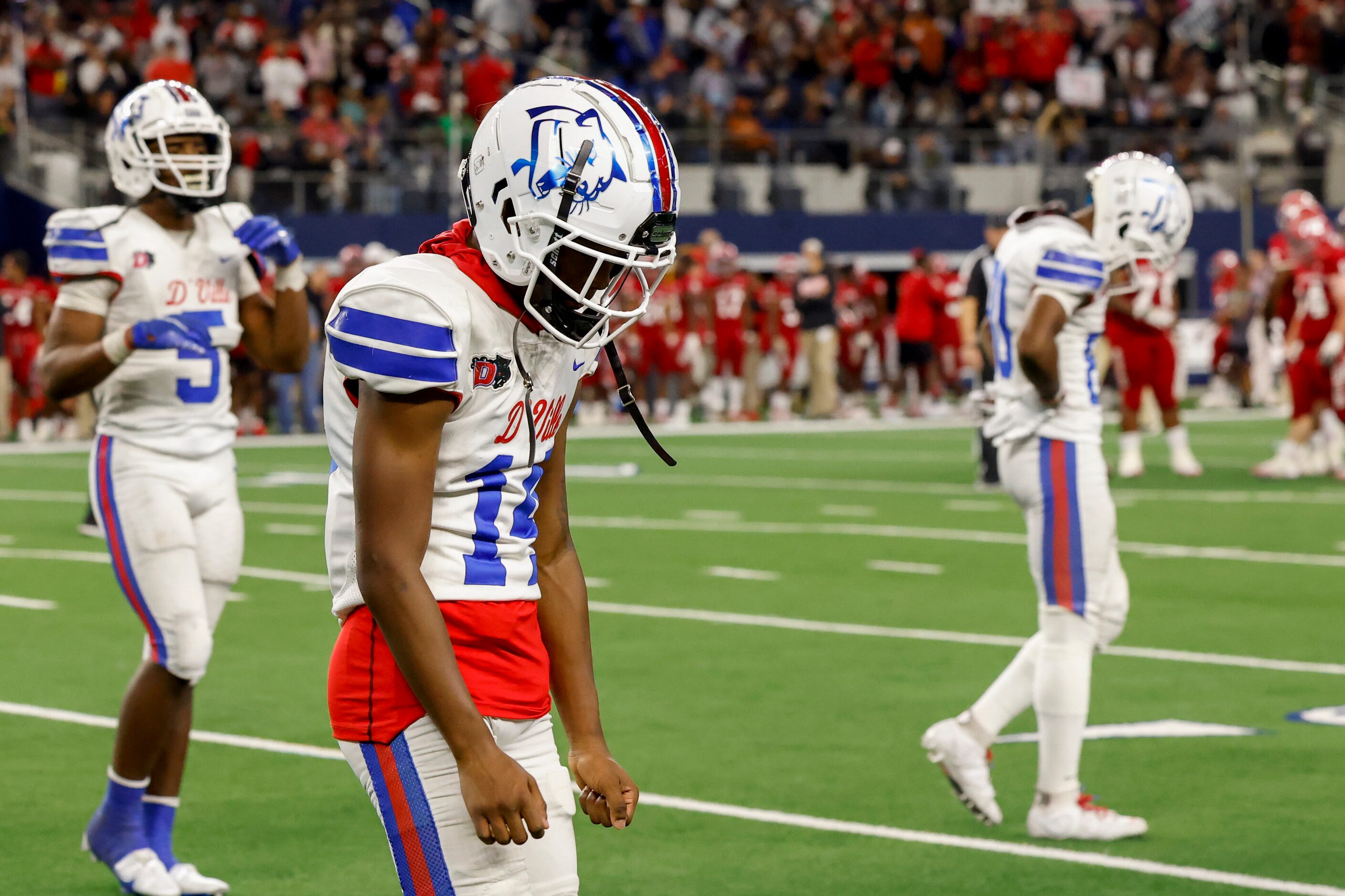 Duncanville wide receiver Davion Bluitt (14) exits the field after a penalty awarded Galena...