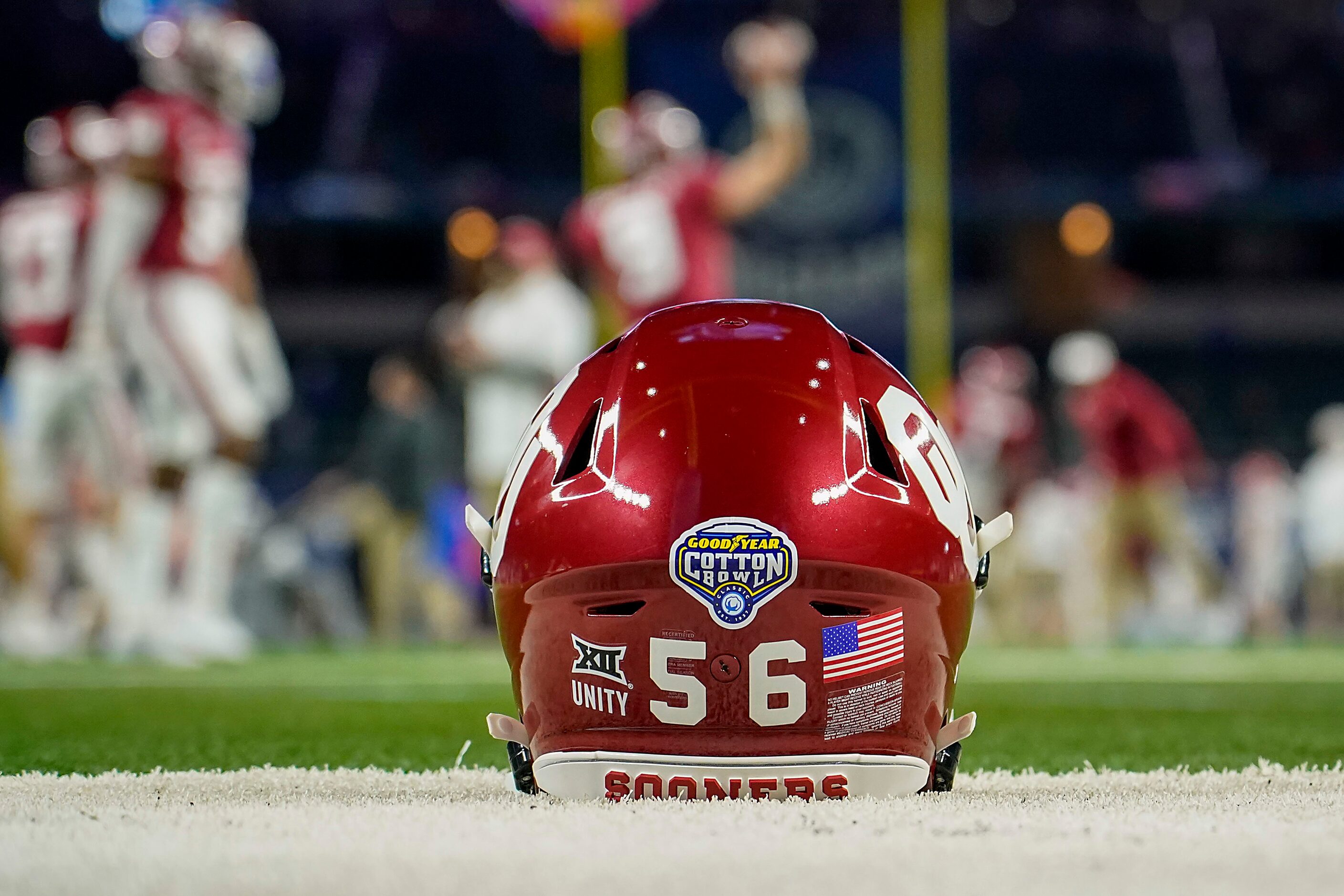 Oklahoma players warm up before the Cotton Bowl Classic against Florida at AT&T Stadium on...