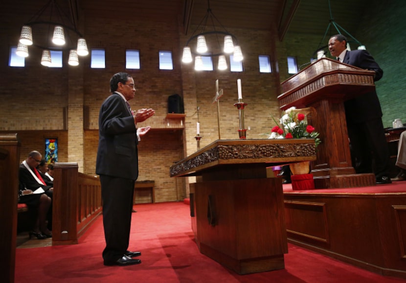 Rev. Stephen Drake (right), senior pastor at Christ Memorial Community Church in Hurst,...