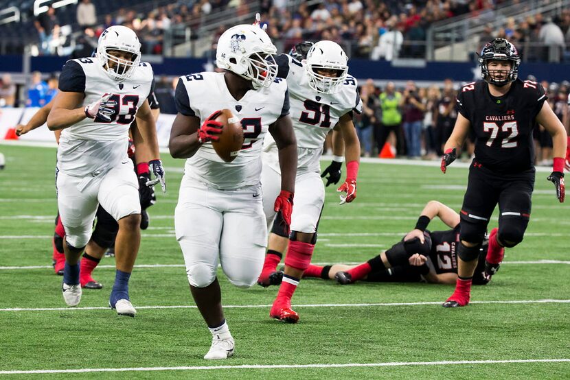 Allen defensive lineman Jayden Jernigan (42) recovers a fumble by Lake Travis quarterback...