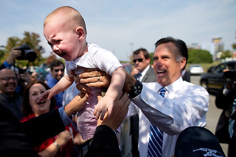 Mitt Romney greeted the audience Saturday at a rally at the Military Aviation Museum in...