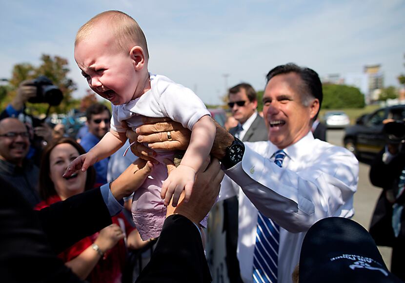 Mitt Romney greeted the audience Saturday at a rally at the Military Aviation Museum in...