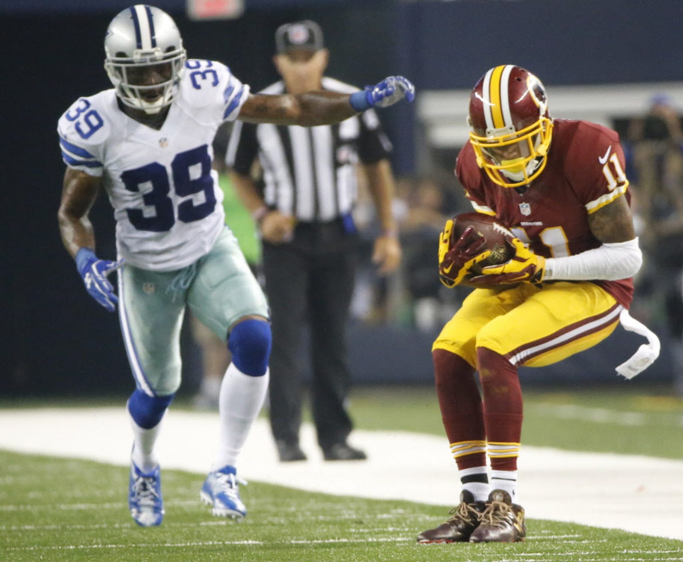 Washington Redskins wide receiver DeSean Jackson (11) catches a pass along the sidelines as...