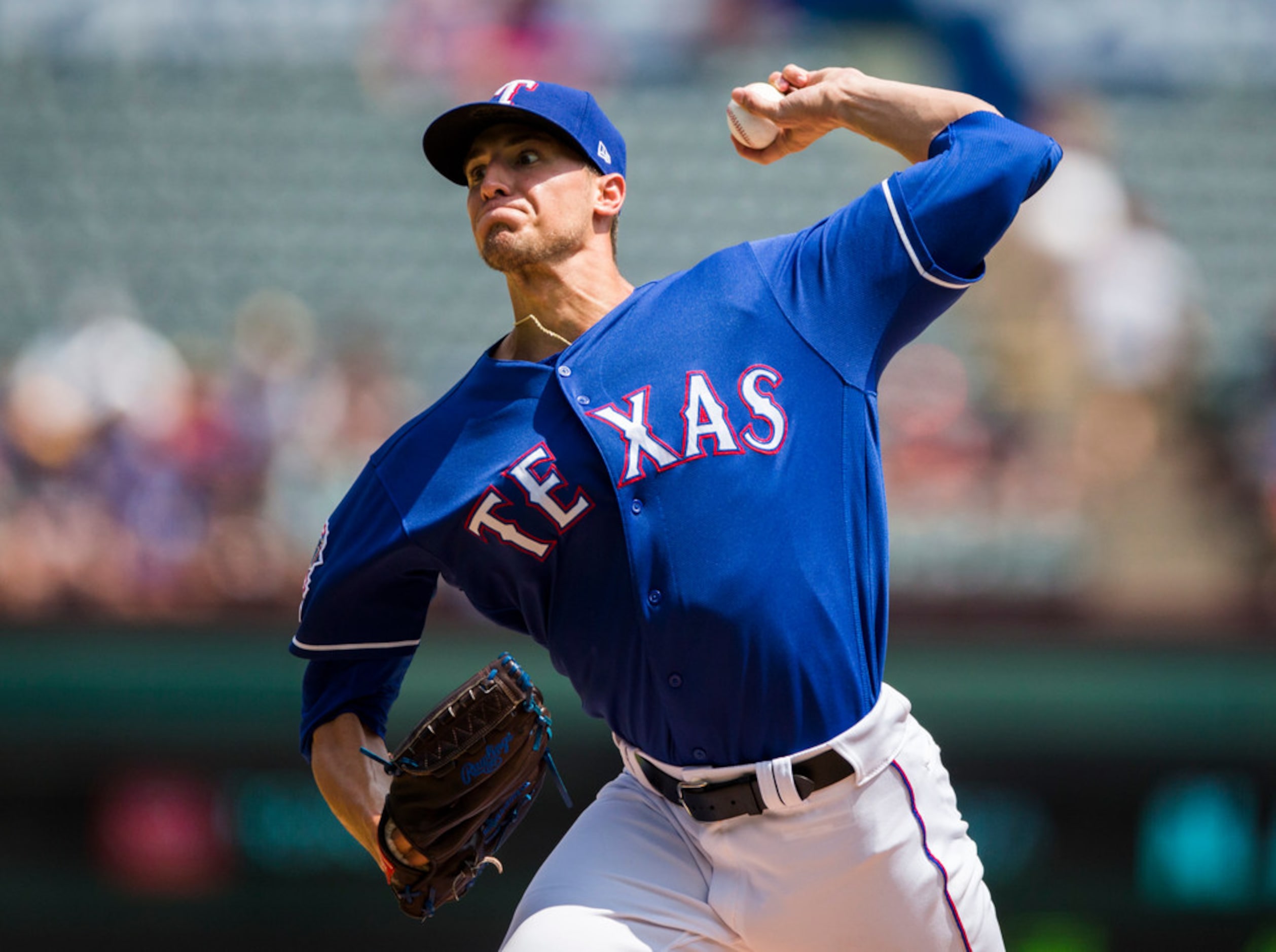 Texas Rangers starting pitcher Brett Martin (59) pitches during the first inning of an MLB...