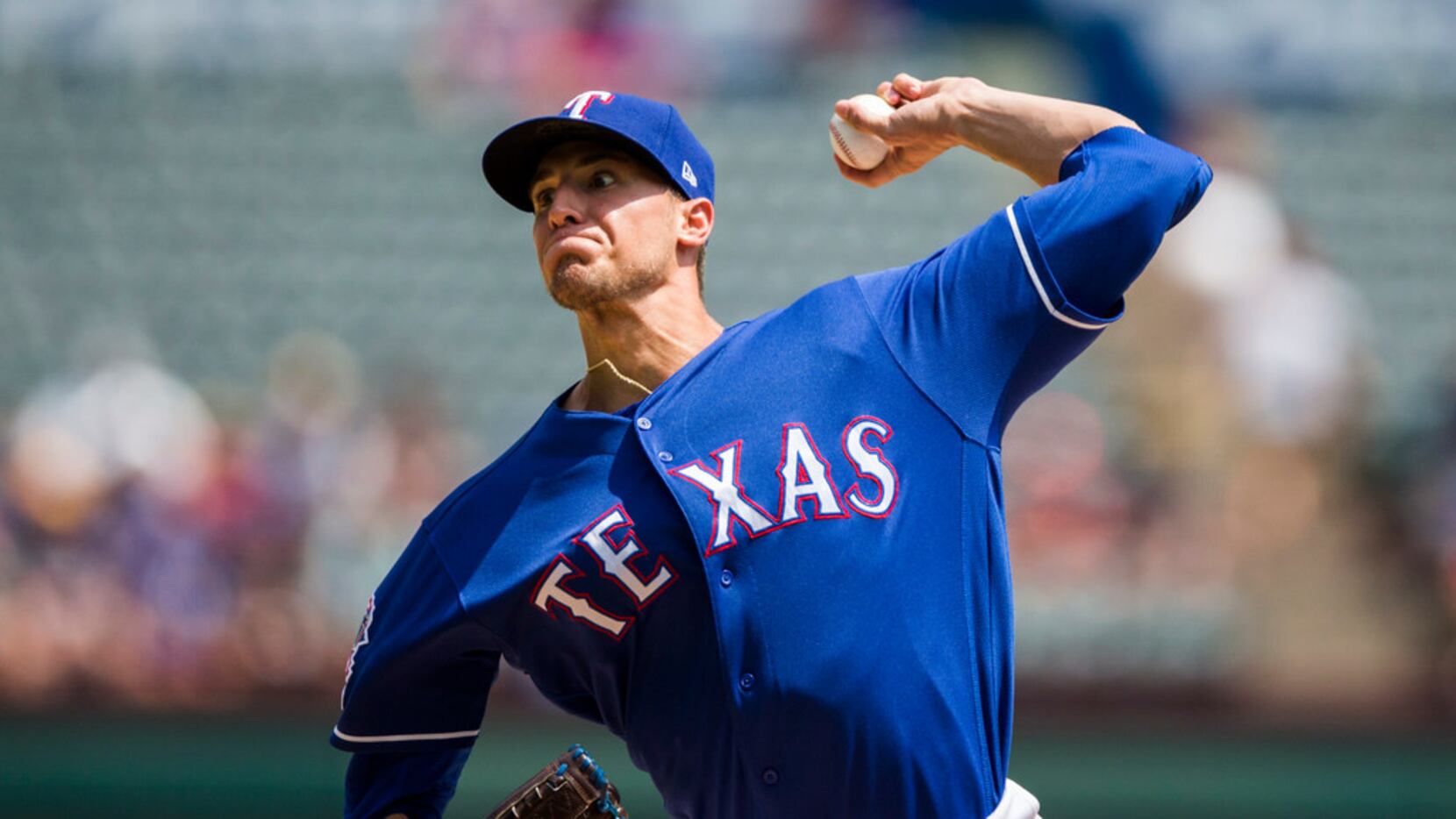 Texas Rangers starting pitcher Brett Martin (59) pitches during the first inning of an MLB...
