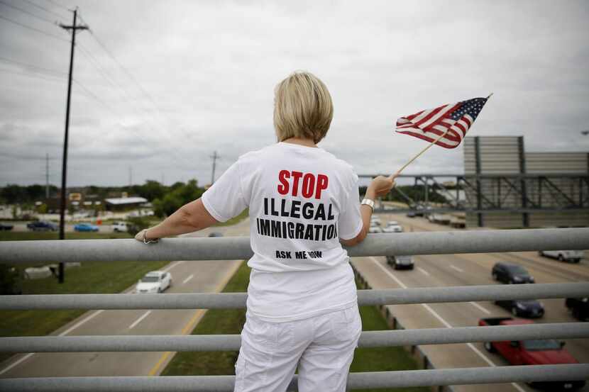 
File photo from a 2014 tea party protest in Allen for tighter border security and...