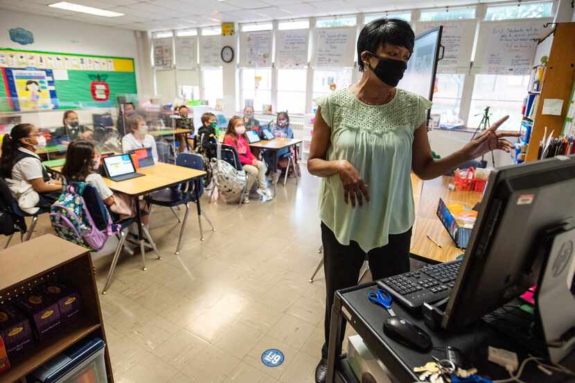 Second-grade teacher Michelle Jones conducted a lesson in her classroom at Tom Gooch...