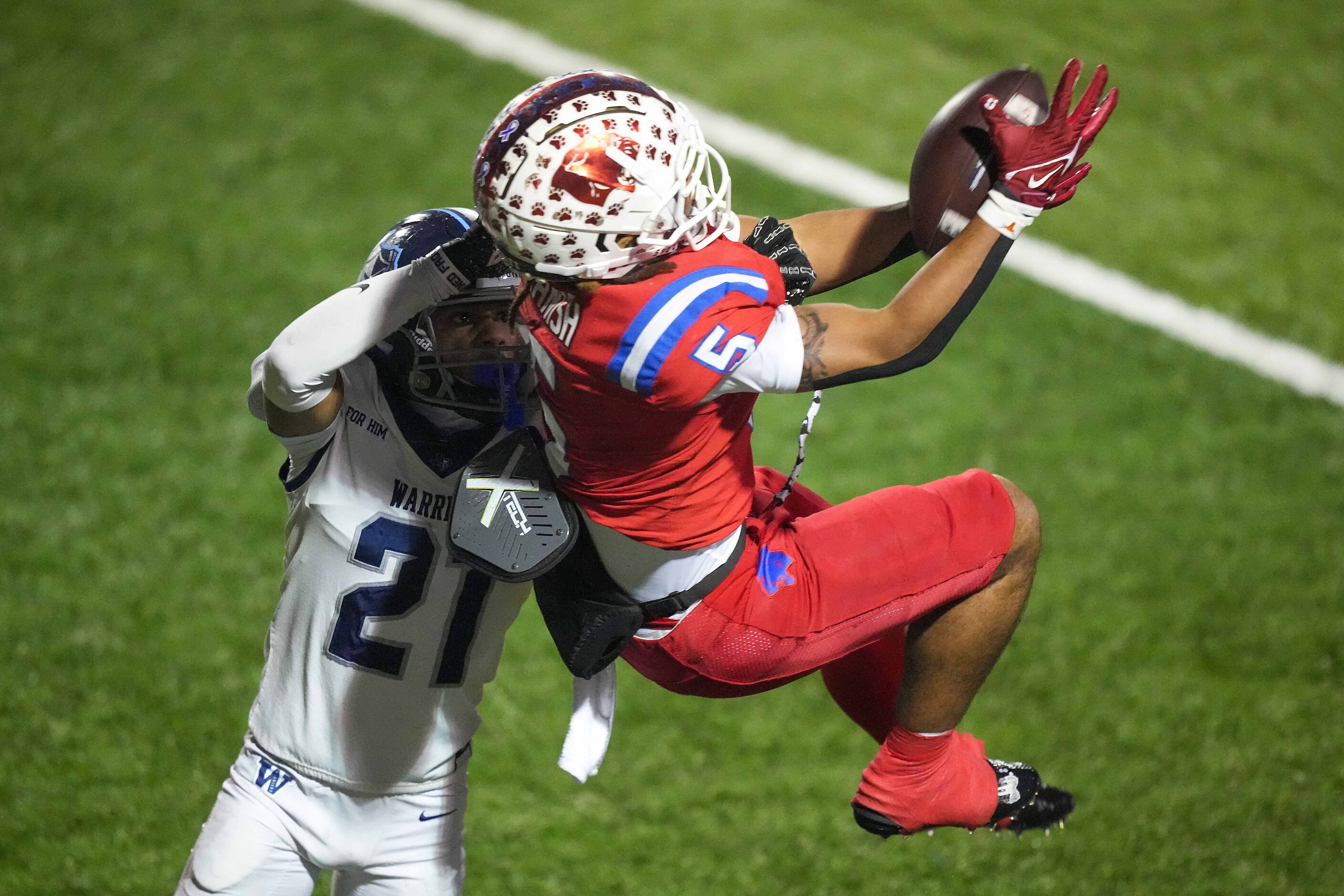 Parish Episcopal Marcus Hanish (5) makes a leaping catch as Argyle Liberty Christian...