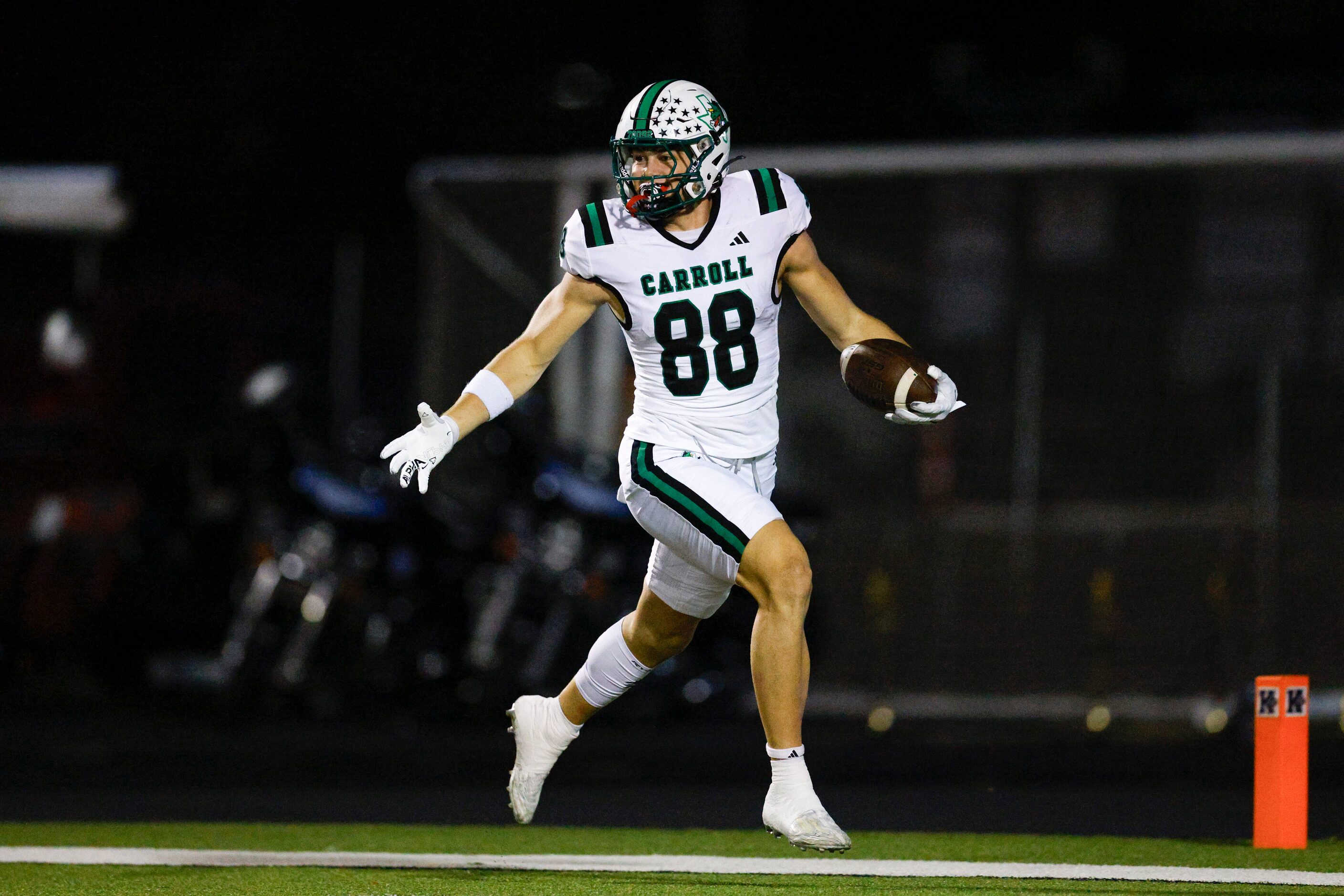 Southlake Carroll tight end Jack Van Dorselaer (88) celebrates his 91-yard touchdown...