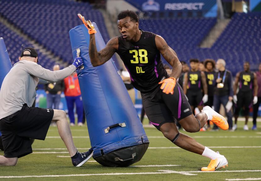 LSU defensive lineman Arden Key runs a drill at the NFL football scouting combine in...