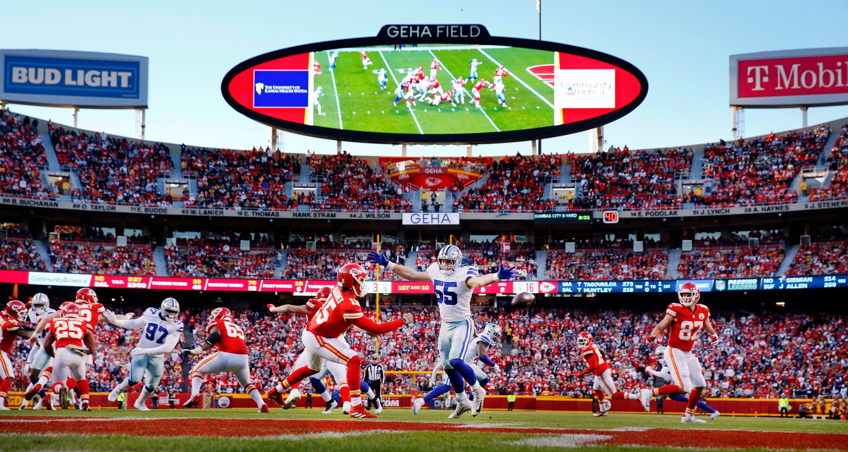 Kansas City Chiefs quarterback Patrick Mahomes (15) side arms a pass to Kansas City Chiefs...