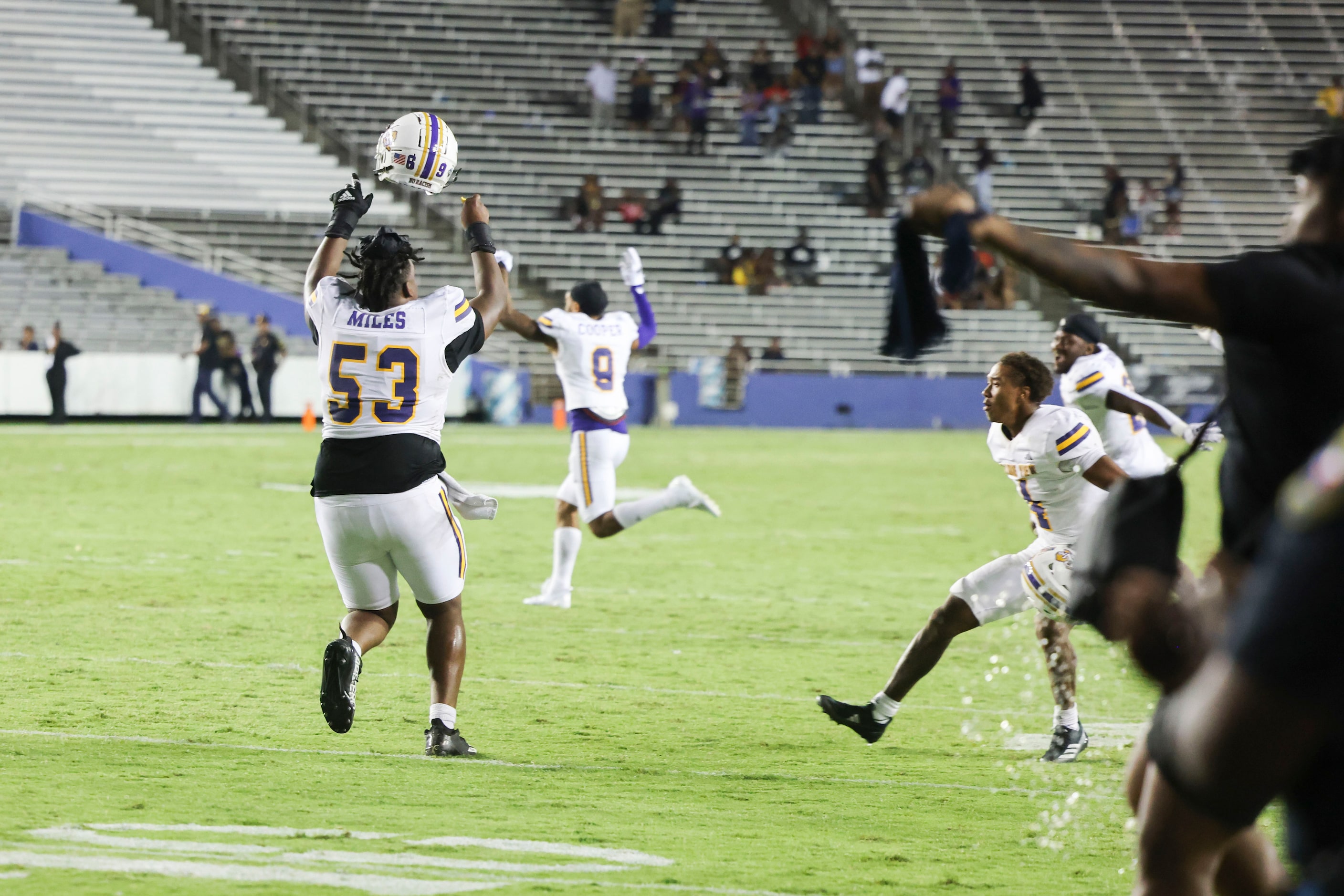 Prairie View A&M players celebrate after the overtime win  against Grambling State in the...