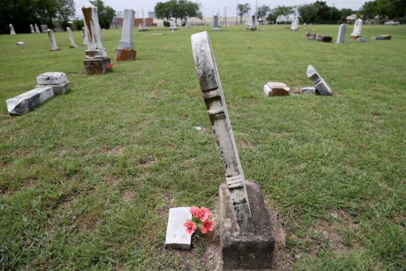 
Graves are leaning, fallen or cracked all over Old City Cemetery, the resting place of...