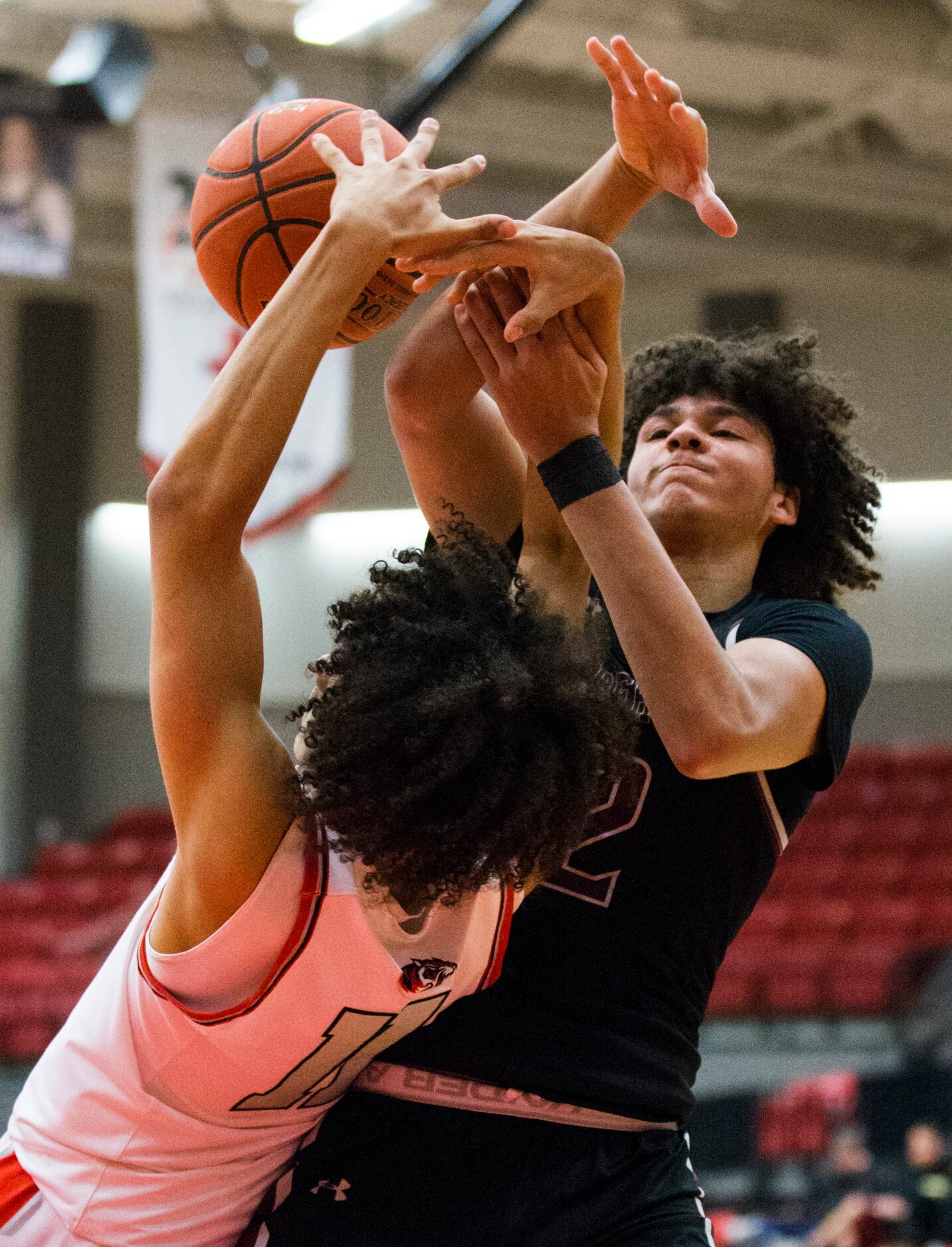 Denton Braswell guard Jaiden Blaylock (11) and Mansfield Timberview forward Cameron Taylor...
