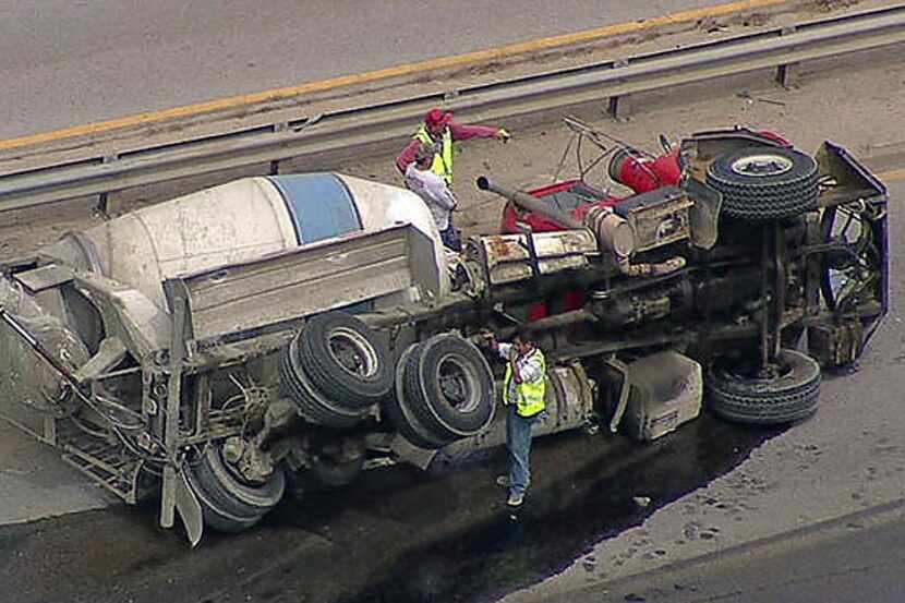 An overturned cement mixer shut down southbound Interstate 45 Friday afternoon in southern...