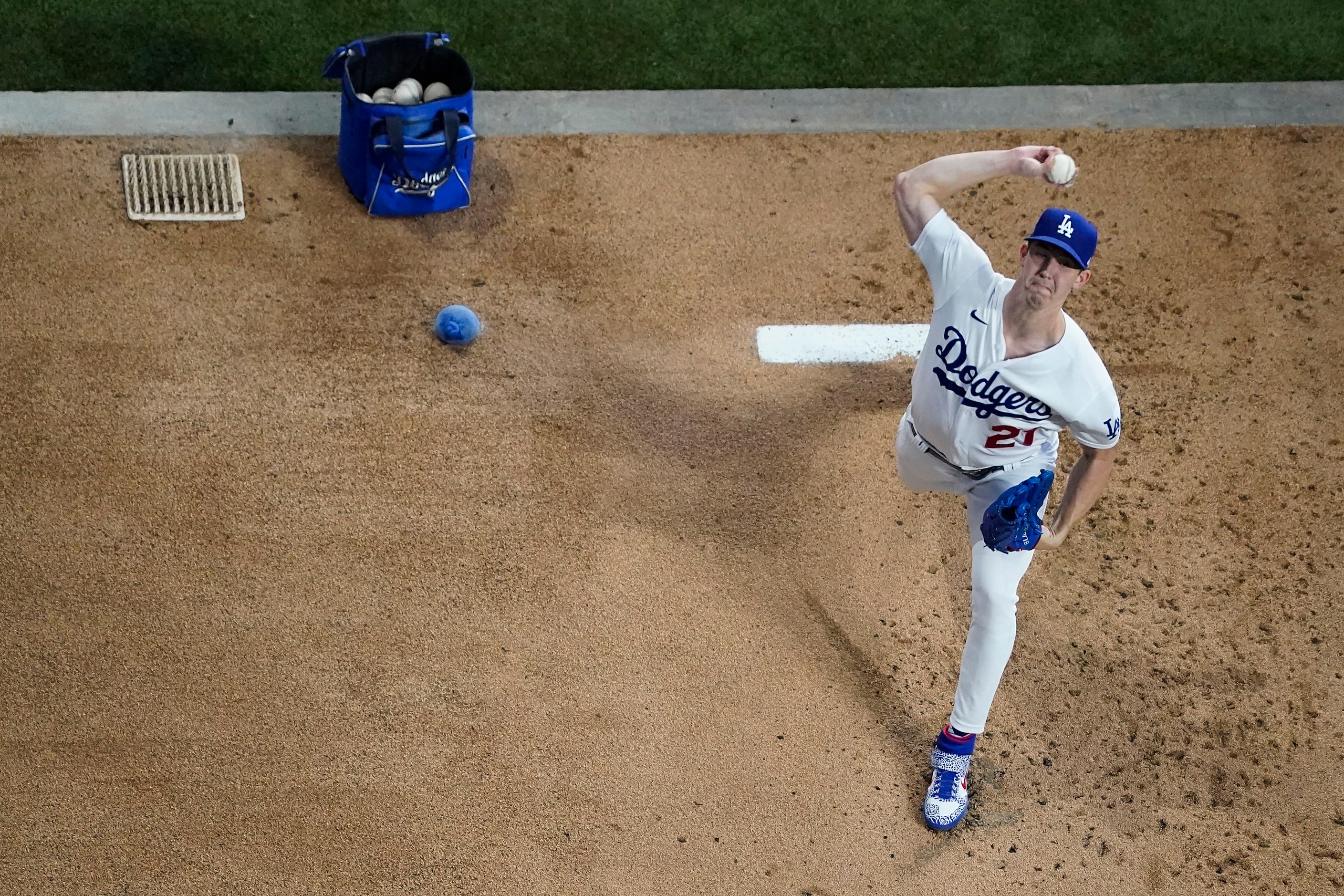 Los Angeles Dodgers starting pitcher Walker Buehler warms up before Game 1 of a National...