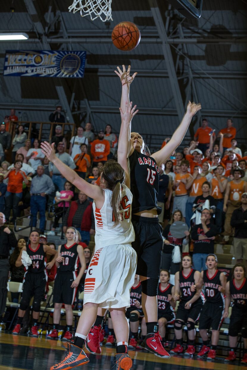 COMMERCE, TX - FEBRUARY 22: Delaney Sain (15) of the Argyle Lady Eagles lays in the ball...