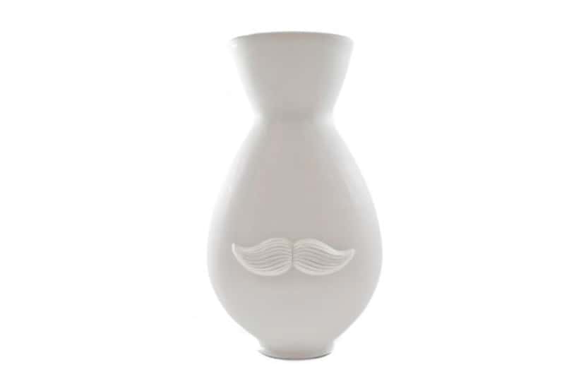 
Enjoy flowers from any angle with this Mr. and Mrs. Muse reversible vase by Jonathan Adler....