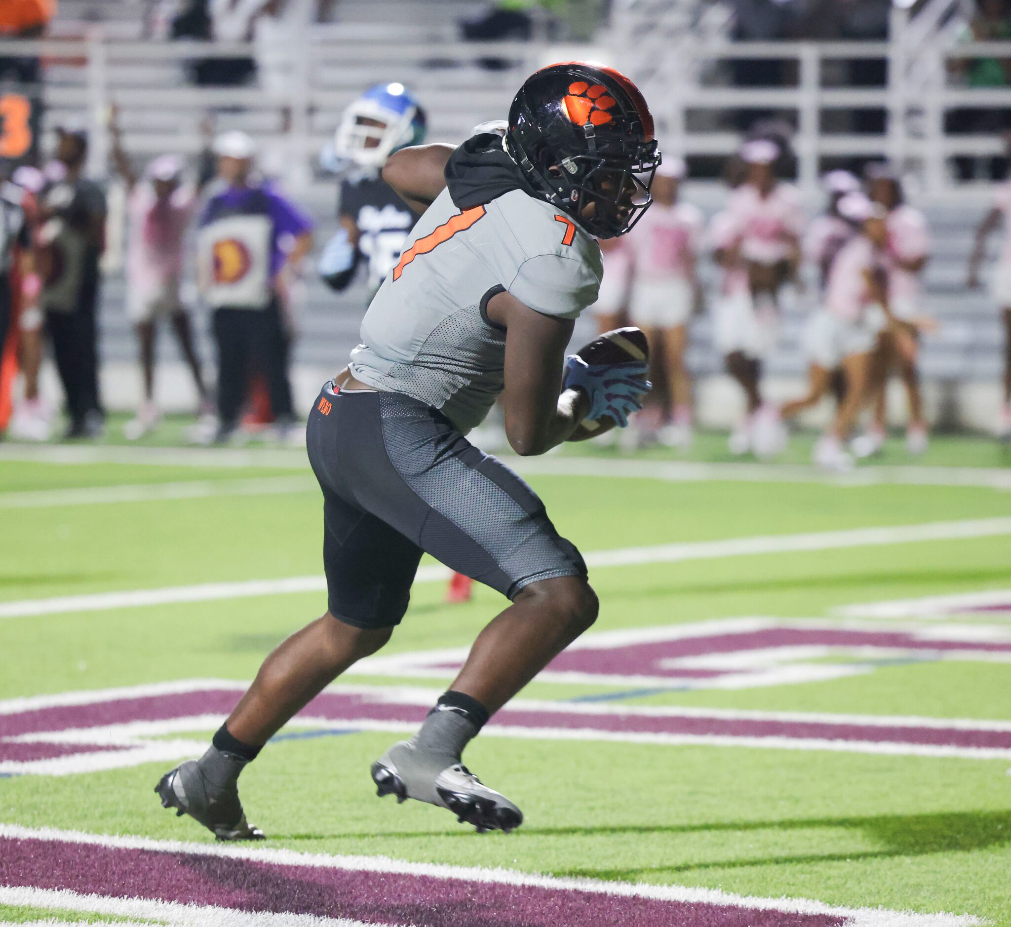 Lancaster High’s Dakeriean Johnson (7) scores a touchdown during the second half of a...