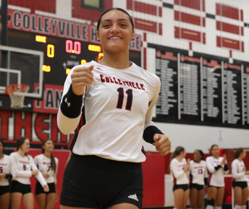 Colleyville Heritage senior outside hitter Suli Davis (11) takes to the court with...