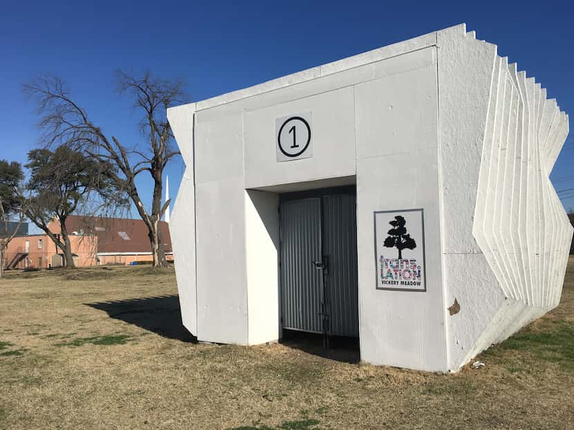 This is one of the white cube-shaped art galleries on the field across from Sam Tasby Middle...