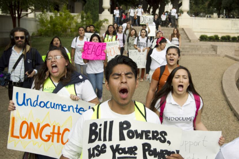 University of Texas student Jonathan Hernandez participates in a rally Wednesday on campus...